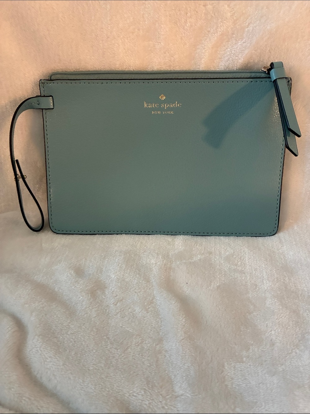 kate spade Teal Leather Wristlet Clutch with Silver Logo. NWT